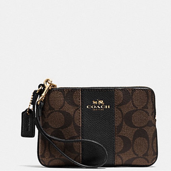 Coach Accessories - COACH CORNER ZIP WRISTLET IN SIGNATURE COATED CANVAS WITH LEATHER